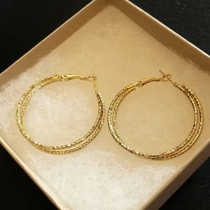 "Pretty Girl" Gold tone hoop earrings by Natural Girls Rock